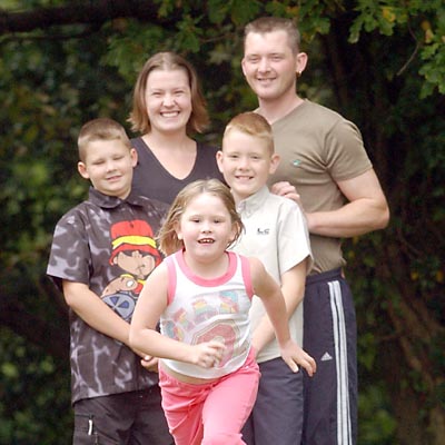 Liver transplant girl Lucy Augustus with her family, mum Vicky, brothers James, left, and Joshua, and dad Paul